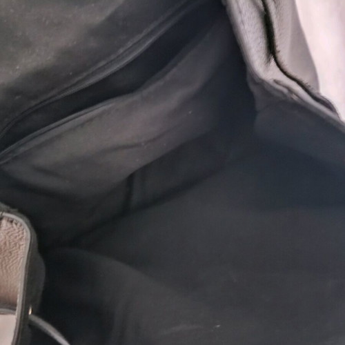 Black women's backpack used with wear and defects