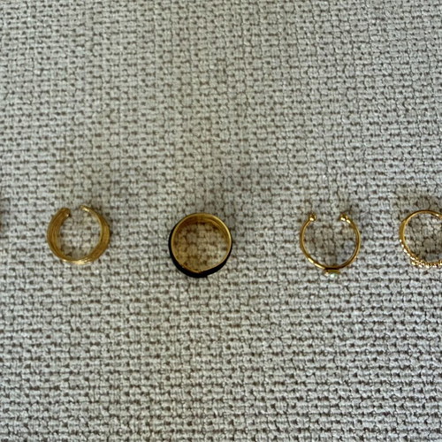 Steel rings like new, set of 5, gold color