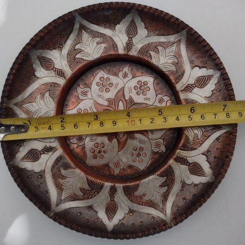Copper Greek handmade carved wall plates used, all together
