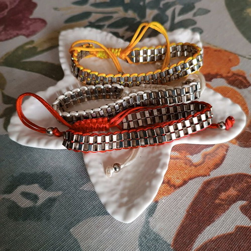 Bracelet set of 3 new with silver chain and cord in red, white, yellow