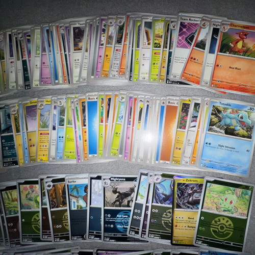 Pokemon bulk cards set with 125 non-foil and 58 foil cards