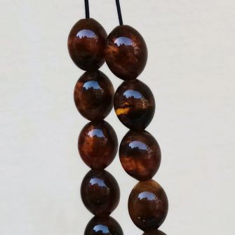 Pressed olive amber worry beads used, 38 g, 21 beads