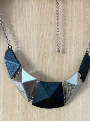 Necklace used with silver and black geometric patterns