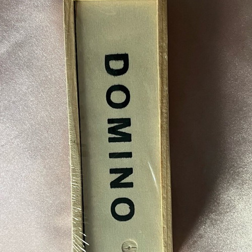 Domino game new in wooden box, classic board game