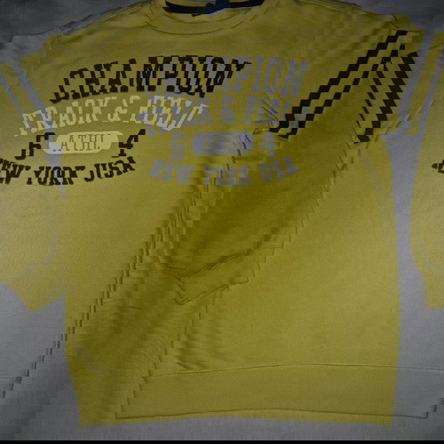 Champion yellow sweatshirt used for 9-10 years with blue print