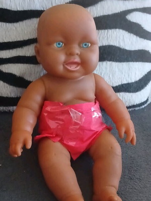 Boy doll dark-skinned like new
