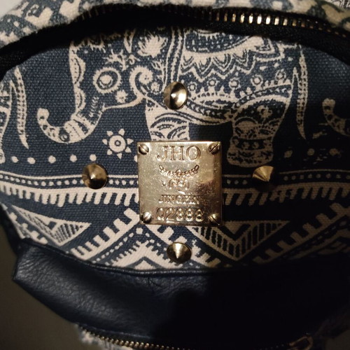 Backpack like new white and blue with elephant design