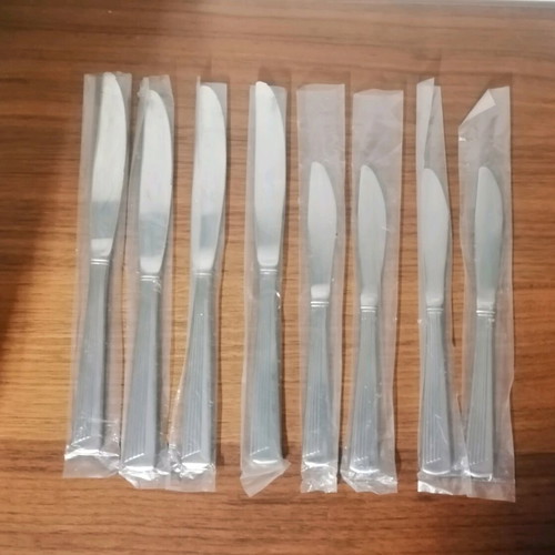 Inox knife set of 8 unused, 4 large and 4 small