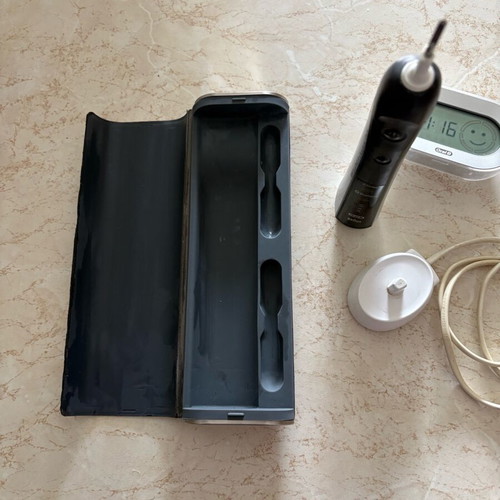 Oral-B Triumph IQ 5000 electric toothbrush used