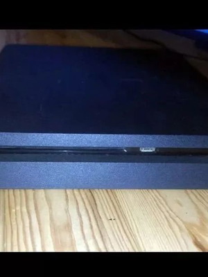 PlayStation 4 Slim 500GB used with cables and HDMI