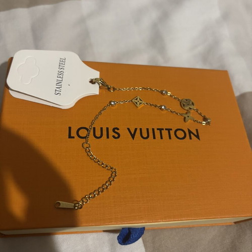 Louis Vuitton bracelet new, gold color