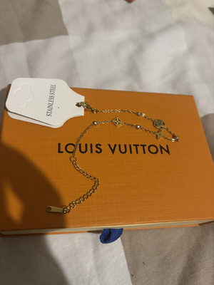 Louis Vuitton bracelet new, gold color