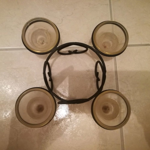 Metal candle holder used for four tealight candles