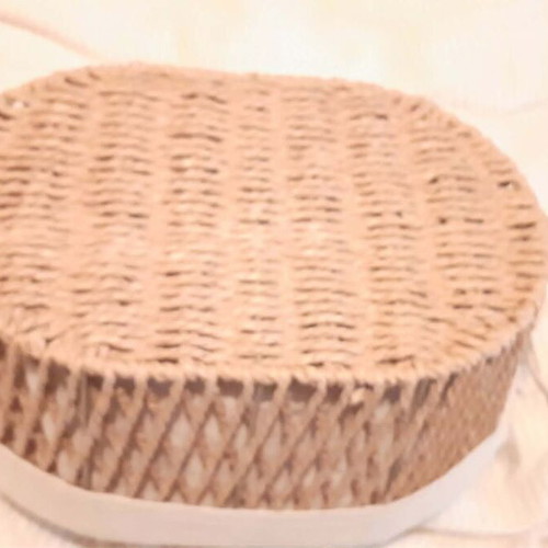 Oval basket like new with fabric lining and handles
