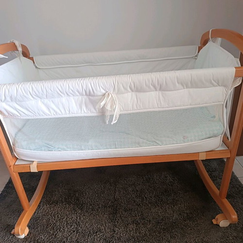 Vintage wooden baby cot with used Greco Strom mattress