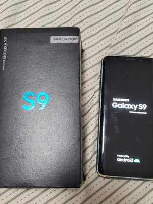 Samsung Galaxy S9 smartphone with box and case