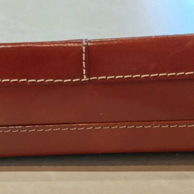 KEM leather handbag with crocodile pattern and tan details