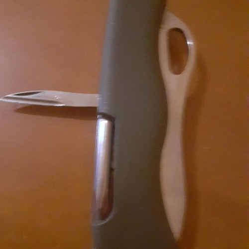 Two multitool pocket knives new with scissors and serrated blade
