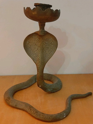 Bronze candlestick used with cobra design