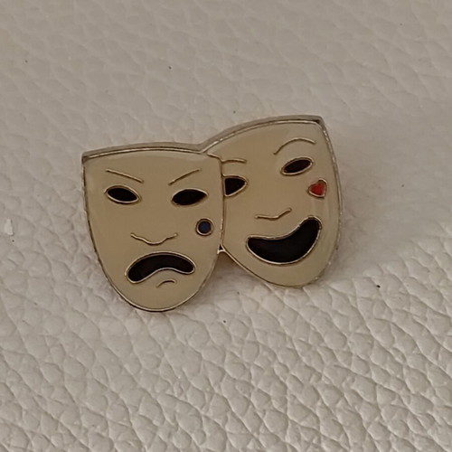 Burberry enamel comedy and tragedy pin like new, gold tone