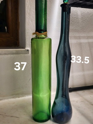 Glass bottles like new, set of 2, blue and green Roma