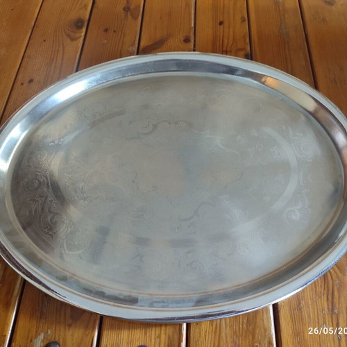 Silver-plated oval serving tray like new with embossed decorative designs