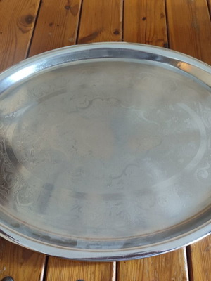 Silver-plated oval serving tray like new with embossed decorative designs
