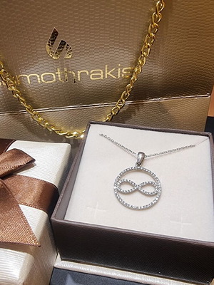 Infinity pendant silver 925 with zircon stones, plated