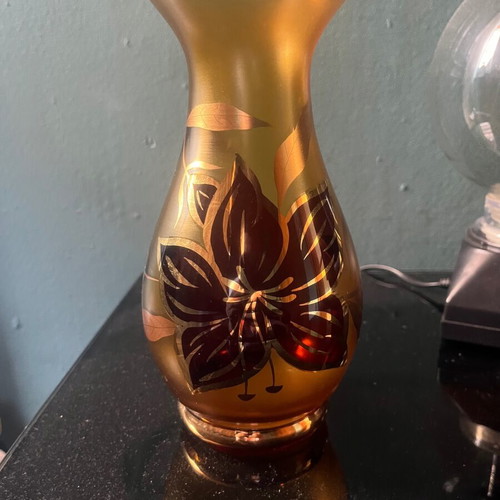 Antique vase made of amber glass with handmade black and gold flowers, like new