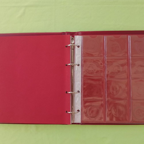 Coin album used, large size with 4 rings and 6 sleeves