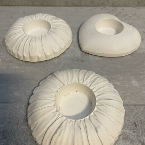 Plaster candle holders set of 3, like new, flower and heart shapes