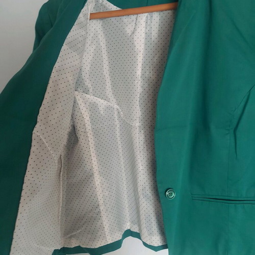 Women's green jacket used, size small, short fit