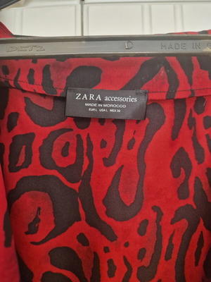 Zara animal print bodysuit size L like new, black and red