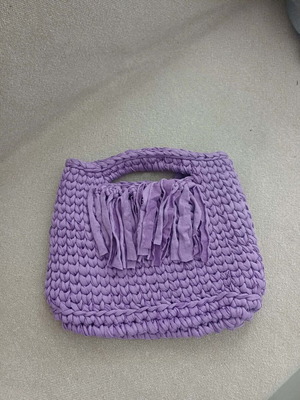 Handmade lilac knitted handbag with fringes