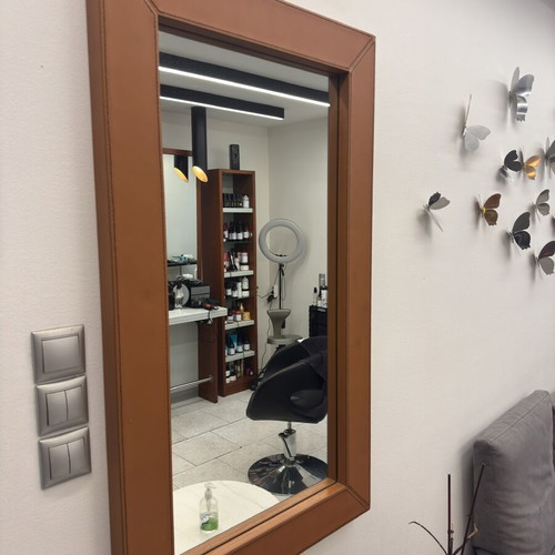 Wall mirror used with cognac leather frame