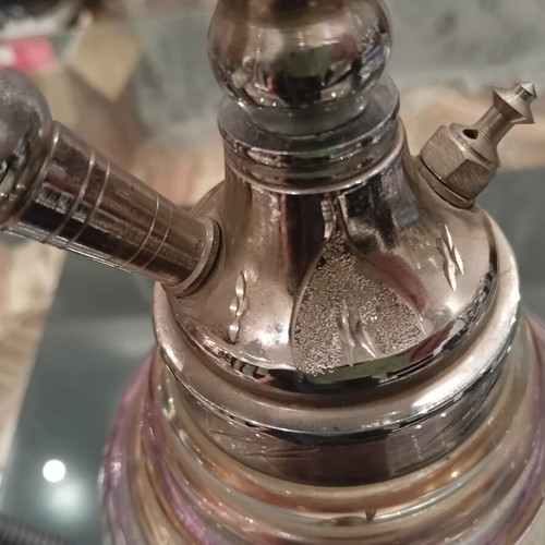 Hookah used with traditional Egyptian metal design and glass base