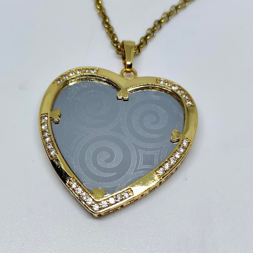 Heart Pendant Necklace with Embossed Spiral Designs, like new