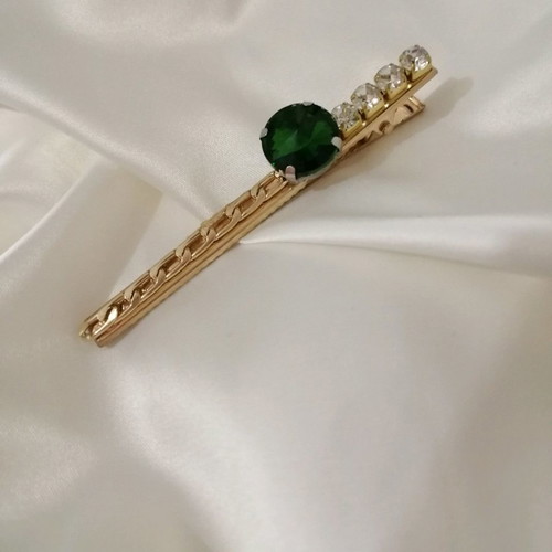 Hair clip new gold color with silver rhinestones and green gem