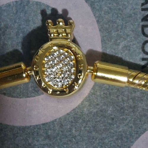 Pandora bracelet size 20 cm, gold plated with crown clasp