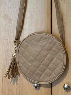 Avon round crossbody bag beige-pink like new