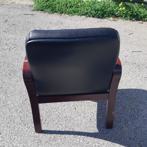 Leather chair with wooden arms and legs like new, ideal for office