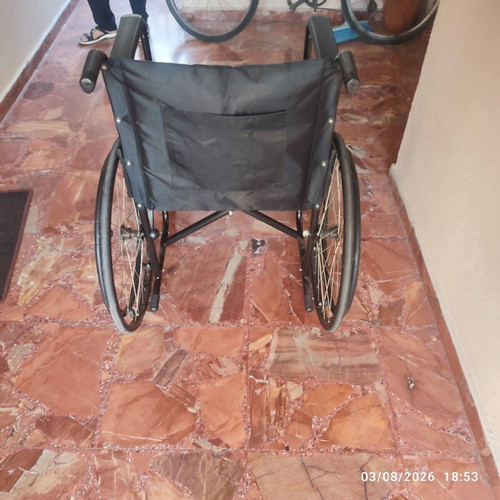 Indoor wheelchair with tripod cane and night container holder like new