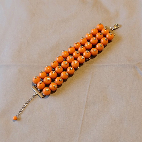 Accessorize bracelet used with orange beads 21 cm
