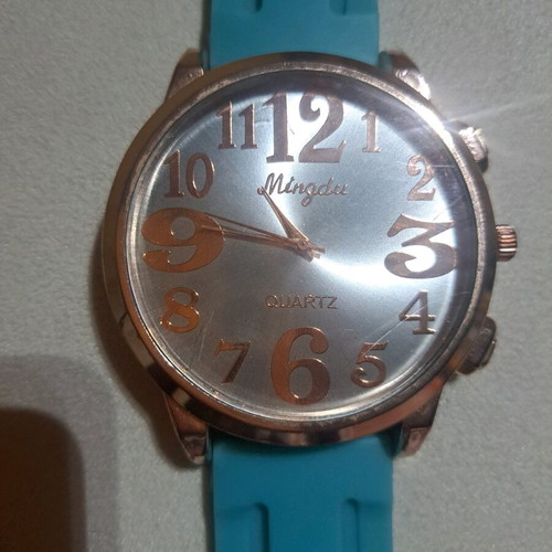 Women's watch used, rose gold with turquoise rubber strap