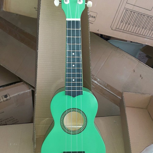 Ukulele new small elegant light green