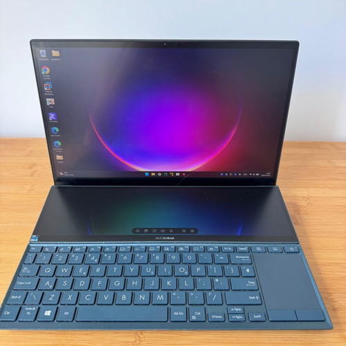Asus ZenBook DUO UX482EAR laptop used with ScreenPad Plus dual touchscreen
