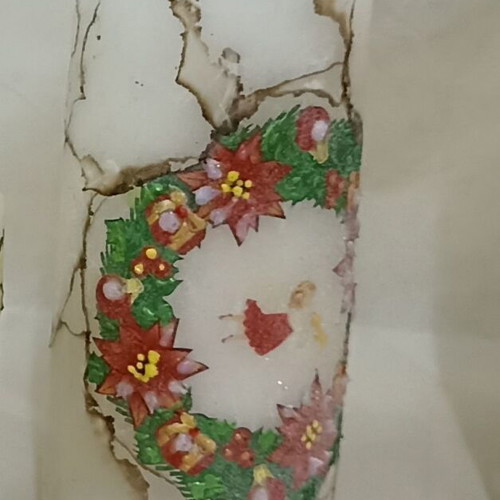 Handmade decorative candles with wax art