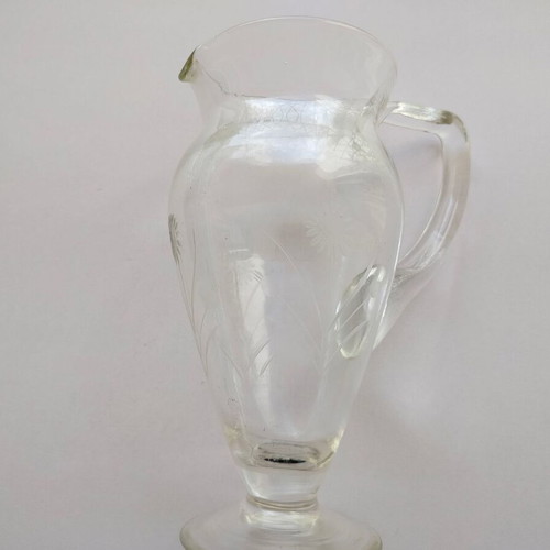 Cut glass pitcher used with minor wear