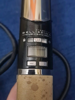 Bellissima hair straightener like new, leather handle