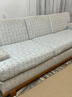 Three-seater sofa used with wooden base and fabric